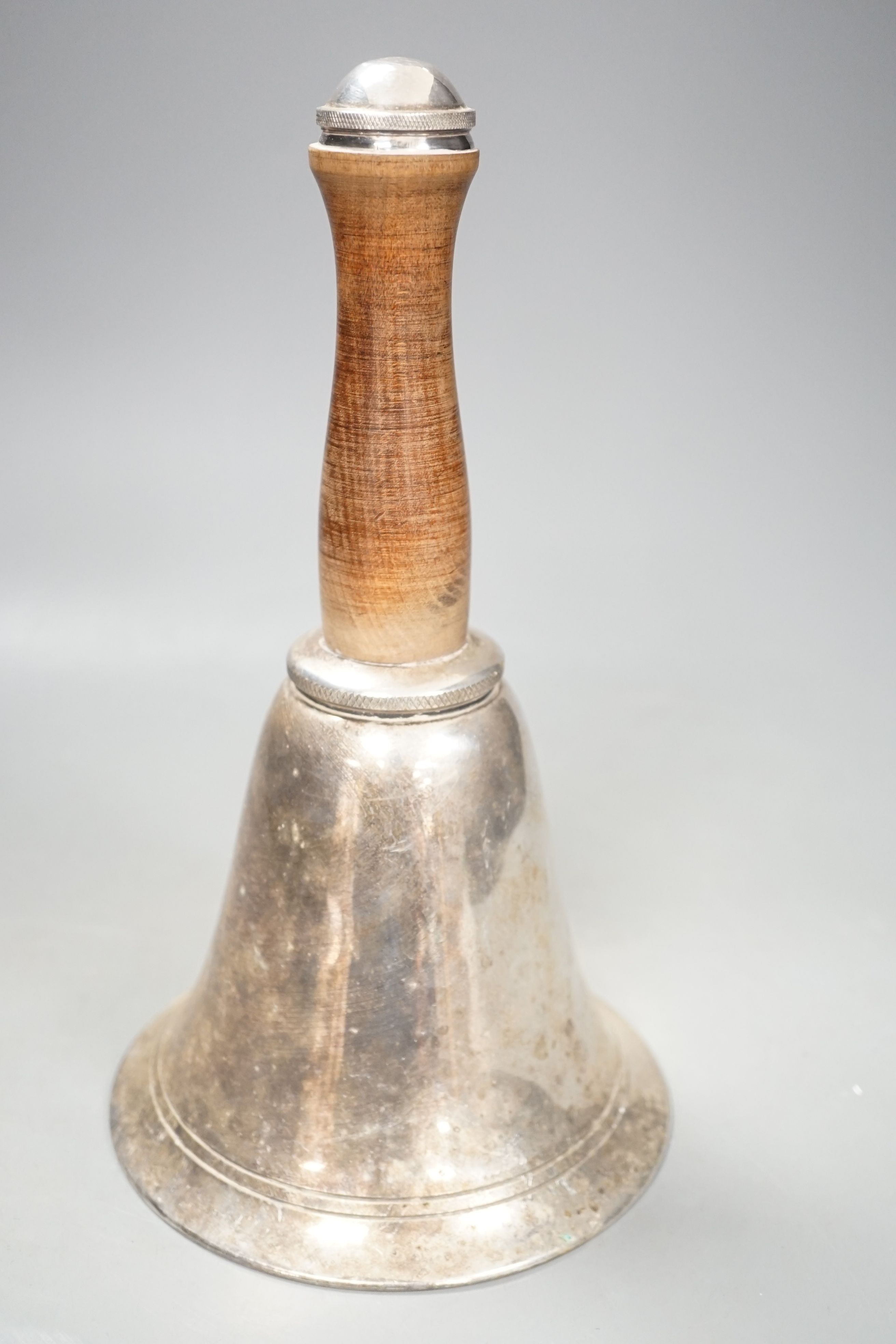 A Dunhill style novelty silver-plated cocktail shaker modelled as a hand bell, 27cm